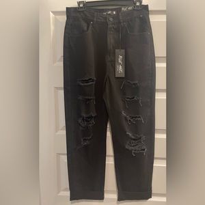 Jeans black distressed, size 7.  Ankle jeans and high rise.